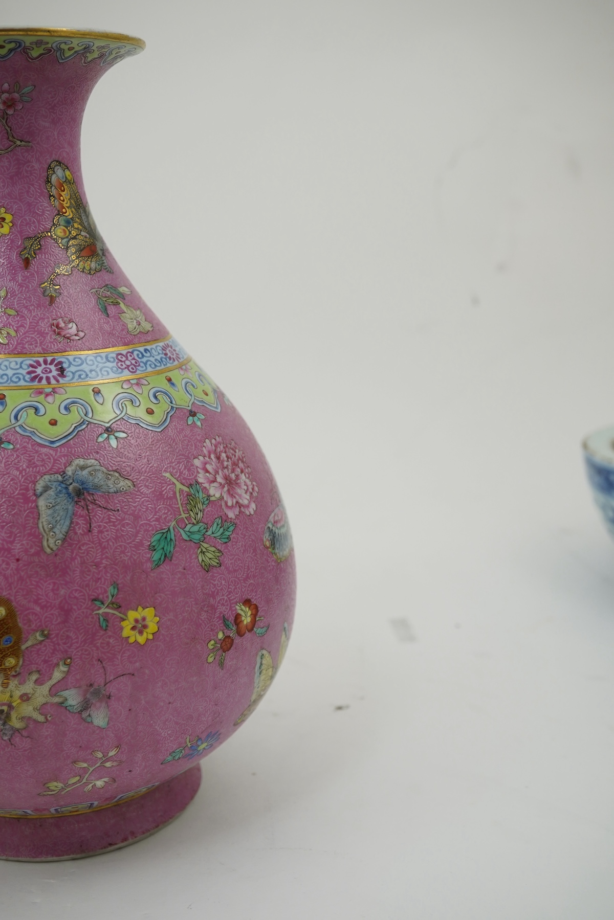 A Chinese pink-ground sgraffito pear-shaped vase, yuhuchunping, Daoguang six character seal mark and of the period (1821-50)